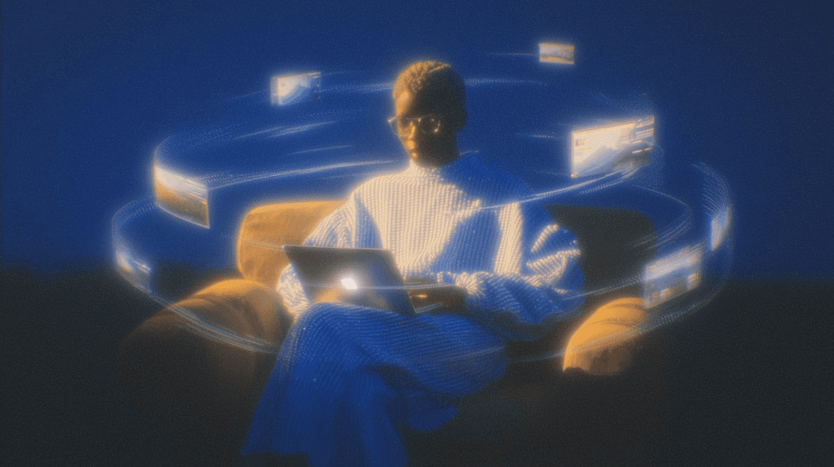 Hero section artwork in the Dreamscape style: a person on a sofa lit by a laptop at night, ringed by swirling ribbons of blue light and floating browser windows
